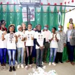 The winning Pace Setters Team from Ijaiye Housing Estate Senior Grammar School in a group photograph with U.S. Consulate Public Affairs Officer Stephen Ibelli (third right) and U.S. Consulate Deputy Public Affairs Officer Jenny Foltz (second row, third left) with Lagos State Commissioner for Education Folasade Adefisayo during the closing ceremony of the drone soccer competition in Lagos on Saturday.