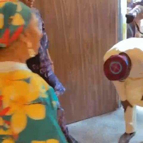 (Video) Nigerians react as Tinubu bows for Orji Kalu's Mother