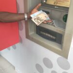 Video: New Naira Scarcity Forces  Nigerians To Fight At ATM 