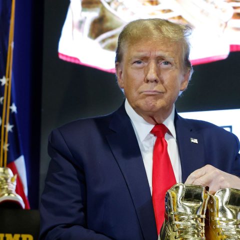 Trump Booed As He Sells Gold Sneakers At Philadelphia Convention