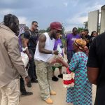 Burna boy hands out food items