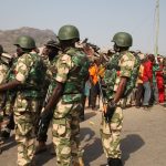 Abia Killings: Go After Criminals Not Innocent Civilians, Nigerians Tell Military Nigerians have called on the military authorities to go after real criminals responsible for killing of five soldiers in Abia State on Thursday last week not harassing and arresting innocent civilians. The Nigerian Army had after the ugly incident that occured at Obikabia Junction in Aba the commercial hub of the state released a statement vowing to retaliate over killing saying “accordingly, it is absolutely imperative that the military retaliate against this dastardly act against troops. The military would be firece in it's response. We would bring overwhelming military pressure on the group to ensure their total defeat.” Subsequently, videos trending online showed military officers deployed to Abia raiding the area in apparent search for criminals who killed their colleagues. Some clips showed soldiers gather some people in the area.and interrogate them. There were also reports that soldiers have been harassing many residents of the area since Friday. Some Nigerians criticised the act saying that military officers are not suppose to be in city centres because the country is not at war. “Soldiers are supposed to on the front line. Why the city? Are we at war?” Another X user, Alani 10Lions one Elephant cried out. According to a Premium Times report, spokesperson of the 14 Brigade of the Nigeria army in Ohafia, Abia State, Innocent Omale, confirmed the arrest of some residents but said they were later released. Aba residents complain over the actions of the military in retaliation to the death of their men. Mr Christian Ekocha, who is a resident of the area claimed that there have been choppers and helicopters flying around the area numerous times a day. “There was even a rumour that soliders opened fire on civilians in Ngwa road. Although, I have not confirmed the authenticity of the information. But youths are being harassed and interrogated by these military personnels,” he added. Nigerians on their X handles urged the military not to harm innocent civilians in a quest for retaliation. “Dropping military men is unacceptable. Go hard on the criminals and not the armless citizens,” Adewale ‘Damilare urged the military. Netizens also called on the Abia State Governor, Alex Otti, to intervene so that the military would not take catastrophic actions against citizens. “Howbeit, this is urging Alex Otti to swoop into action to meet with the Nigerian army chief, Lt. Gen Taoreed Lagbaja to call his boys to order. As in their usual characteristics, they are now setting the cart before the horse in Aba, Abia state, just like they did in Okuama community, in Ugheli south LGA of Delta State in March 2024,” Mr Ike God said on his X handle. Recall that in March, 17 military personnels were killed in Delta state, during a peace mission. The community was razed down by some unknown men some days later and the residents alleged it to be the military men in retaliation. Nigerians fear that Aba might experience similar fate.