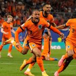 Xavi Simons celebrates after scoring a goal that was then disallowed for offside