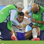 kylian mbappe being attended to at the euro championship