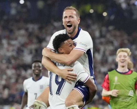 England Captain Harry kane celebrates with goal scorer Olie Watkins