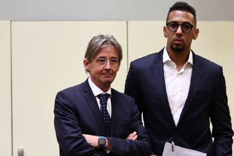 Jerome Boateng (r) appears in court during the verdict Friday