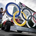 Olympic rings being installed in front of Nantes train station