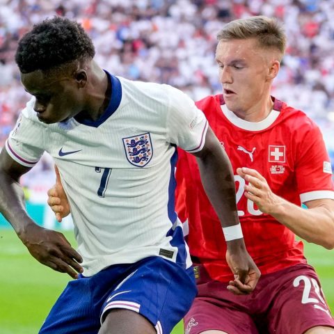 Saka holds off Michel Aebischer in the match against Switzerland