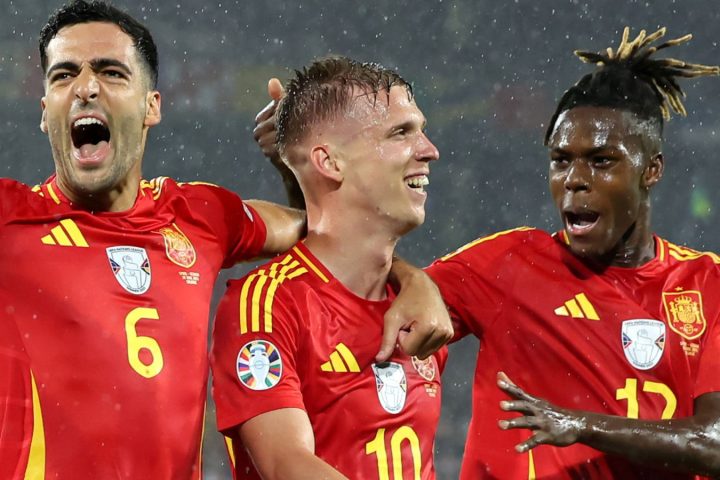Spain celebrate their fourth goal scored by Dani Olmo