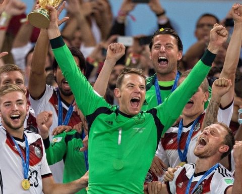 Manuel Neuer lifts the FIFA World Cup trophy with his German national teammates