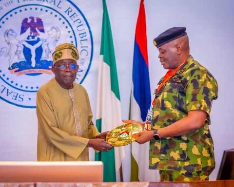 Tinubu with National Defence College official