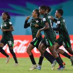 Flamingos celebrate afte edging Domican Republic Wednesday