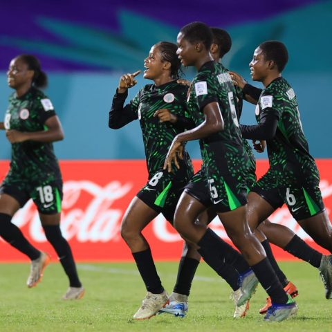 Flamingos celebrate afte edging Domican Republic Wednesday