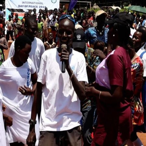 Tambura residents walk and dance their way to Peace Day celebrations