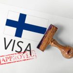 Finland Visa Approved with Rubber Stamp and flag