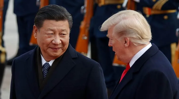 U S President Donald Trump takes part in a welcoming ceremony with China's President Xi Jinping at the Great Hall of the People in Beijing